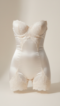 Photograph a luxurious satin shapewear piece with its tailored fit and elegant lace details. The product is perfectly...