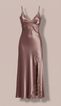 An Urban Black nightgown is centered on a Blush Tone background, emphasizing its bold, chic color. The product is...